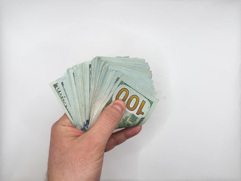 cedulas de dolar em maos abertas