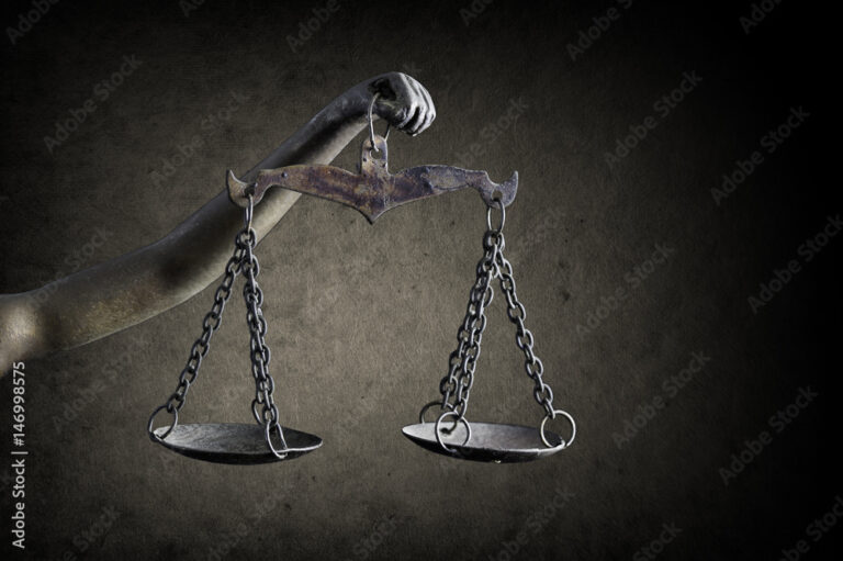 Como reivindicar danos morais por demissão injusta no Brasil 10 mao segurando uma balanca da justica 1