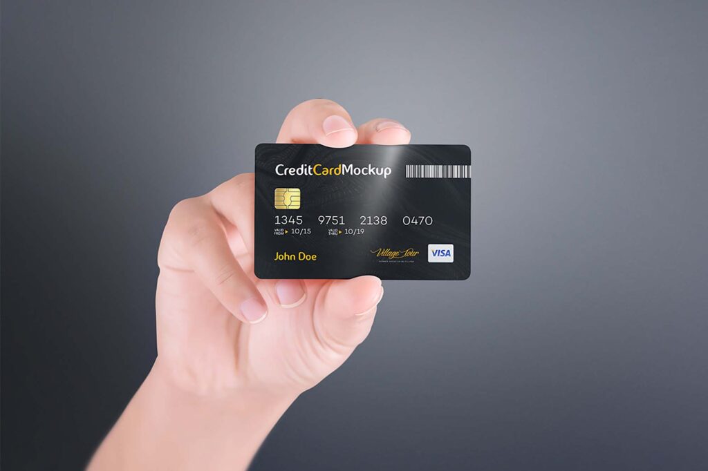 maos segurando um cartao de credito 4